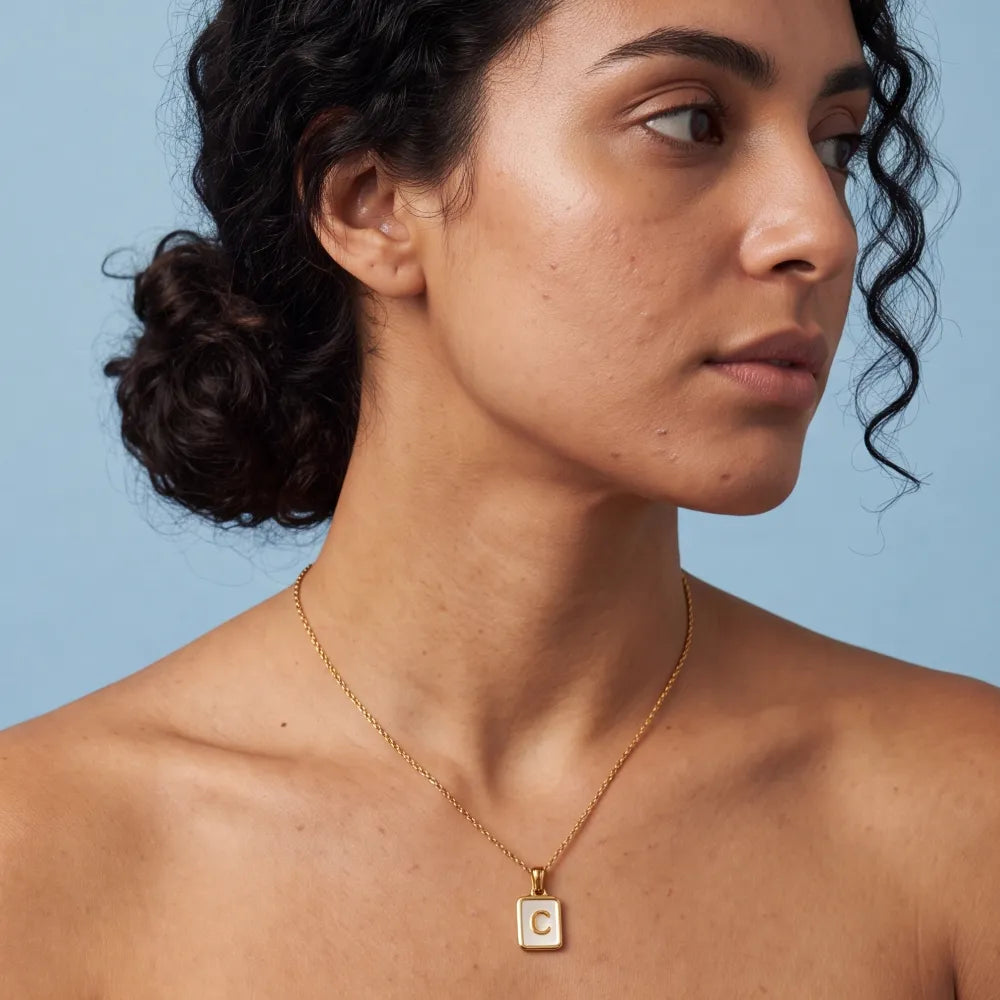 Genora Shell Letter Necklace worn