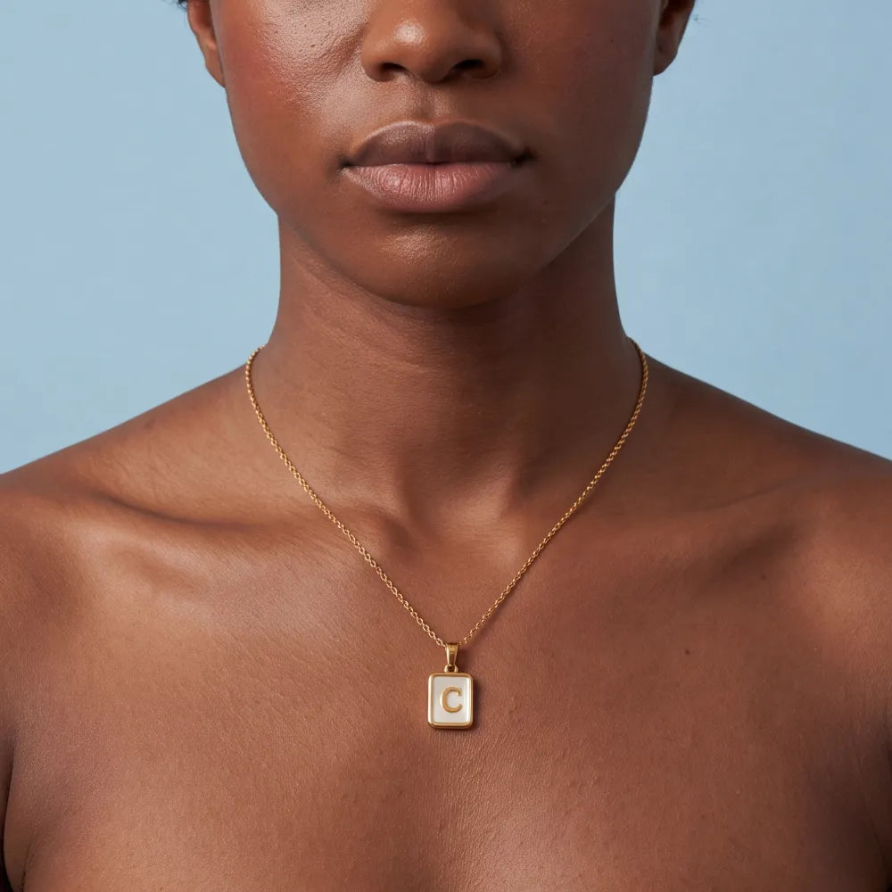 Genora Shell Letter Necklace on model