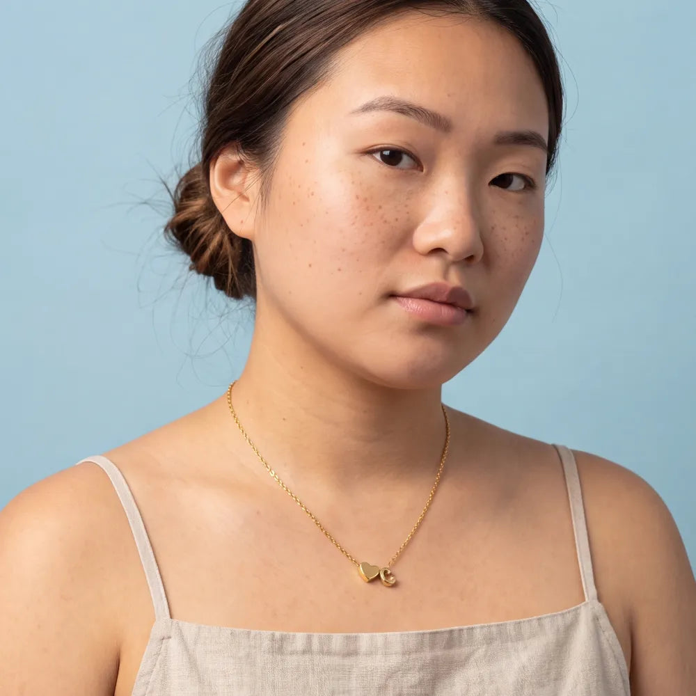 Fenenia Letter Necklaces on model